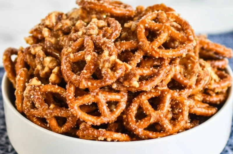 Addictive snack mix with nuts, pretzels, and chocolate for a delicious treat.