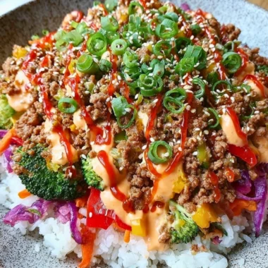 Delicious Bang Bang Ground Turkey Rice Bowls served in a colorful bowl.