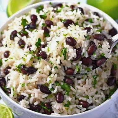 Cilantro lime rice served with black beans in a vibrant dish