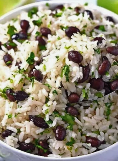 Cilantro lime rice served with black beans in a vibrant dish