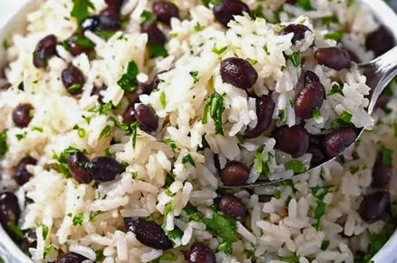 Cilantro lime rice served with black beans in a vibrant dish