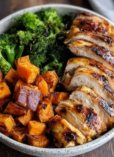 Grilled Chicken & Sweet Potato Bowl with vibrant vegetables