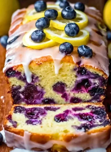Fresh homemade blueberry yogurt served in a bowl with blueberries on top