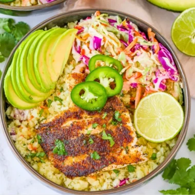 Low carb fish taco bowls with fresh ingredients and vibrant toppings