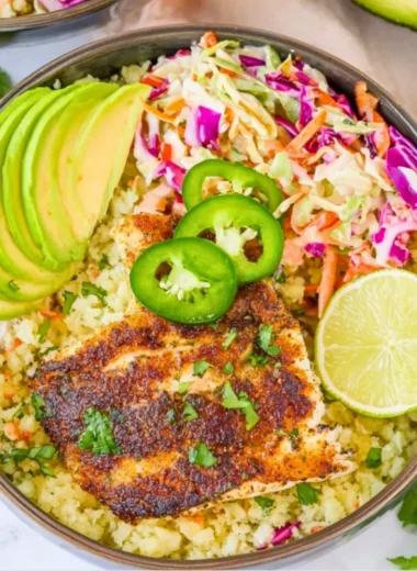 Low carb fish taco bowls with fresh ingredients and vibrant toppings