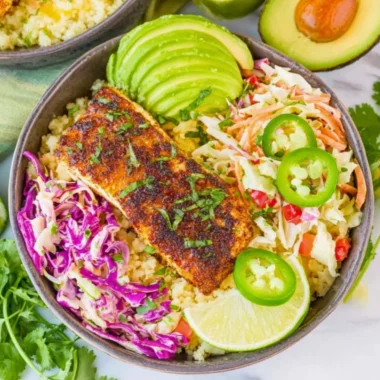 Low carb fish taco bowls topped with fresh ingredients and vibrant flavors