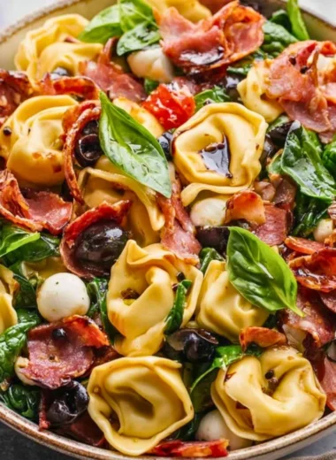 Delicious Tuscan Tortellini Salad with fresh vegetables and herbs