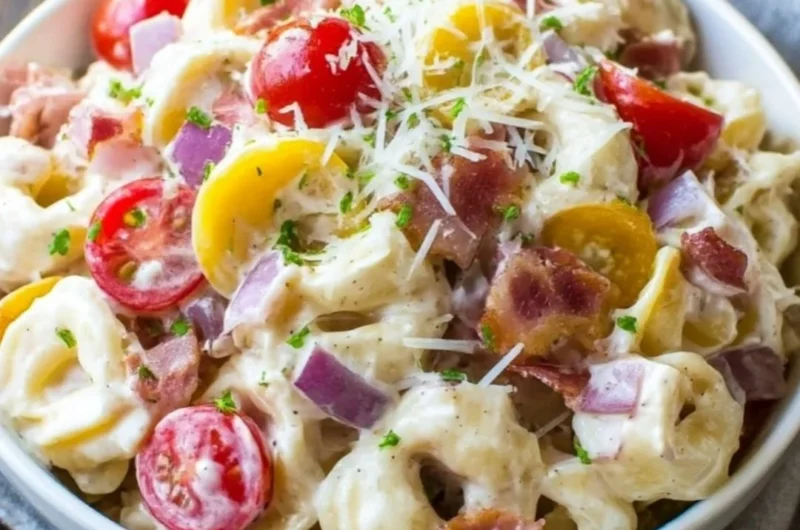Delicious Grinder Tortellini Salad featuring colorful ingredients in a bowl