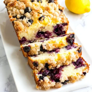 Freshly baked Blueberry Lemon Loaf on a wooden table