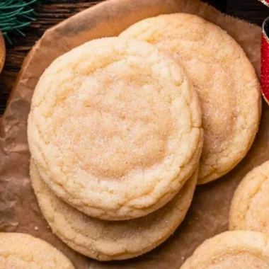 Chewy sugar cookies with a soft texture and sweet flavor on a baking tray