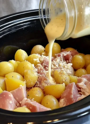 Crock Pot Parmesan Garlic Chicken with potatoes served on a plate