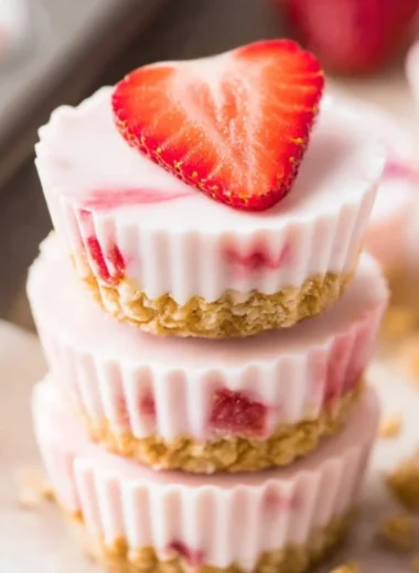 Delicious frozen strawberry yogurt bites ready to be enjoyed as a healthy snack.