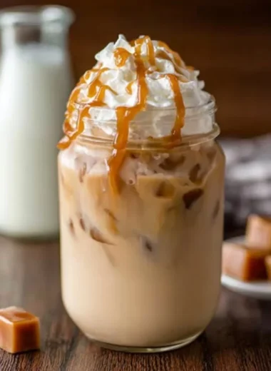 Refreshing iced caramel latte with creamy texture and caramel drizzle