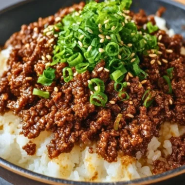 Delicious Korean Ground Beef Bowl topped with fresh vegetables and sesame seeds.