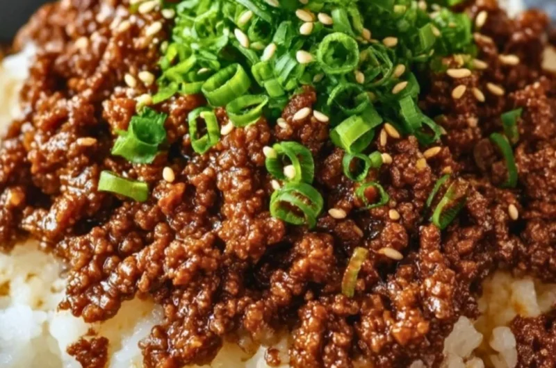 Delicious Korean Ground Beef Bowl topped with fresh vegetables and sesame seeds.