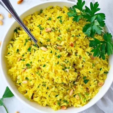 Bowl of Mediterranean Yellow Rice with herbs and spices
