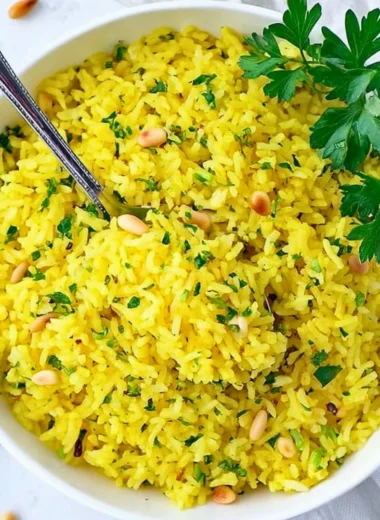 Bowl of Mediterranean Yellow Rice with herbs and spices