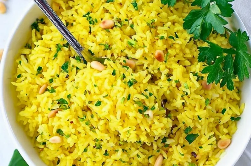 Bowl of Mediterranean Yellow Rice with herbs and spices