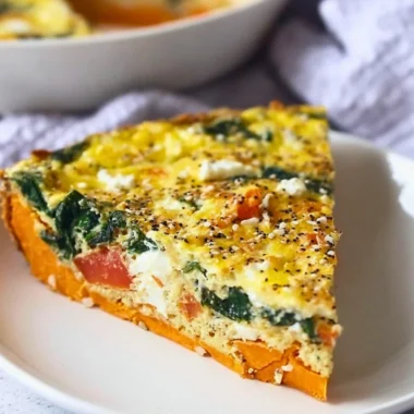 Spinach and Goat Cheese Quiche with Sweet Potato Crust on a plate