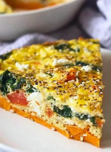 Spinach and Goat Cheese Quiche with Sweet Potato Crust on a plate