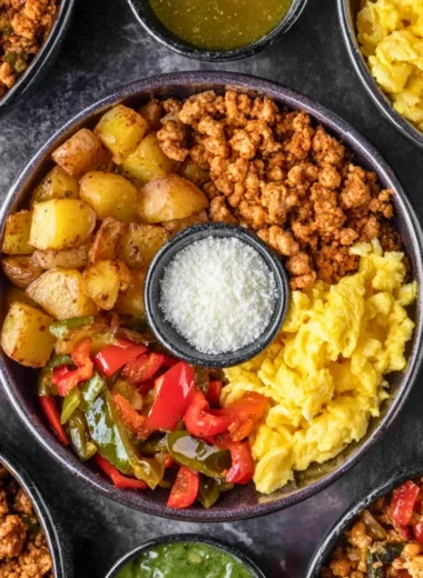 Colorful Tex-Mex breakfast bowls with eggs, beans, and fresh toppings