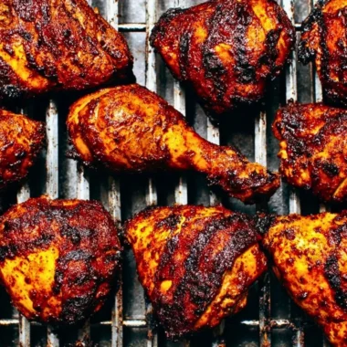 Delicious BBQ Chicken on the grill, ready to serve at a summer barbecue.