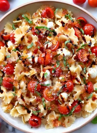 Delicious Bruschetta Pasta Salad with fresh tomatoes, basil, and mozzarella.