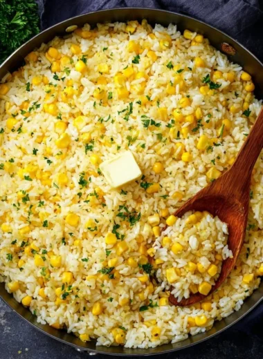 Delicious plate of buttered corn rice served as a side dish.