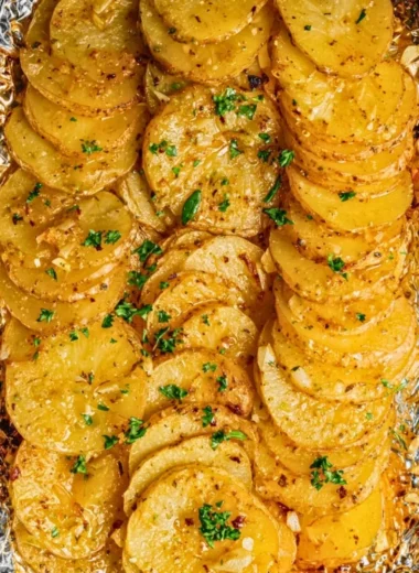 Grilled garlic butter potatoes served as a flavorful side dish