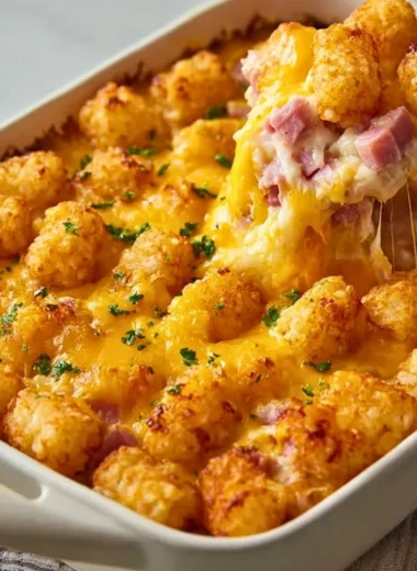 Ham and Tater Tot Casserole with melted cheese and crispy tater tots