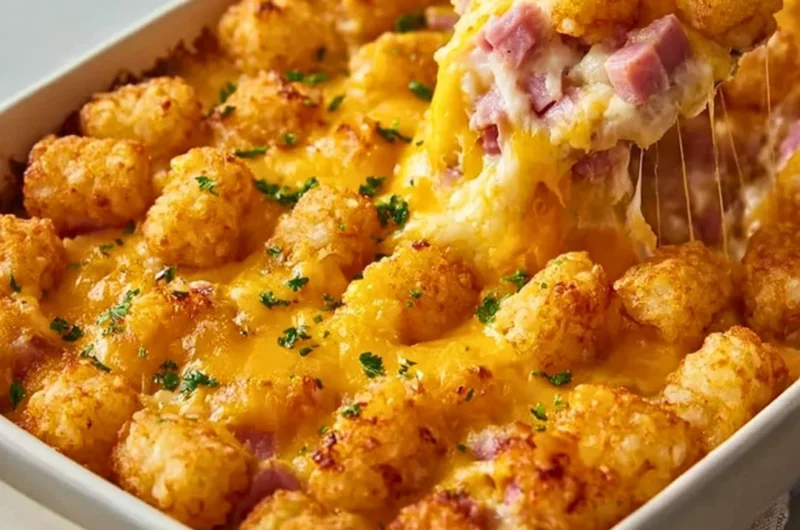 Ham and Tater Tot Casserole with melted cheese and crispy tater tots