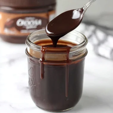 Delicious hot fudge drizzled over ice cream