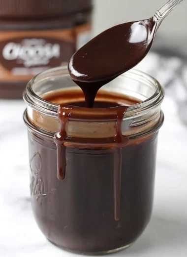Delicious hot fudge drizzled over ice cream
