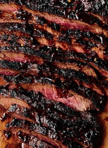 Balsamic flank steak served with grilled zucchini and creamy whipped feta.
