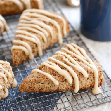 Freshly baked banana bread scones on a cooling rack