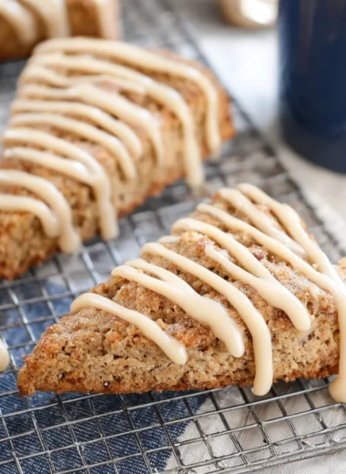 Freshly baked banana bread scones on a cooling rack