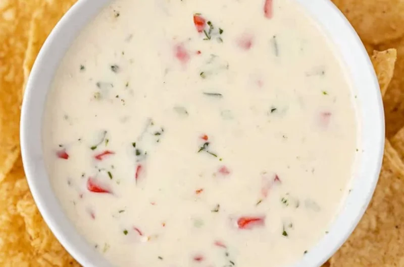 Creamy Mexican white cheese dip served with tortilla chips.