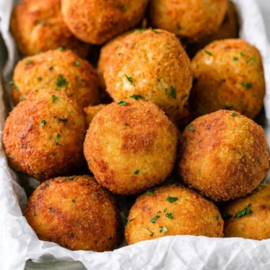 Delicious cheesy rice balls (arancini) ready to enjoy as a snack or appetizer.