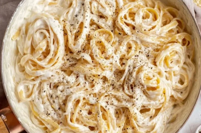 Creamy Cottage Cheese Alfredo sauce served over pasta with fresh herbs.