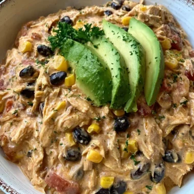Delicious Crock Pot Fiesta Chicken served with colorful vegetables