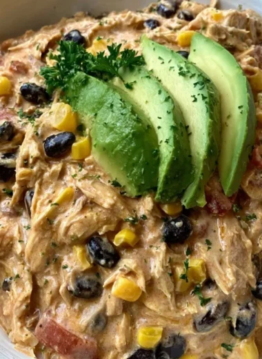 Delicious Crock Pot Fiesta Chicken served with colorful vegetables