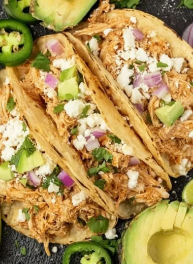 Crockpot Chicken Tacos: tender chicken in soft tortillas topped with fresh ingredients