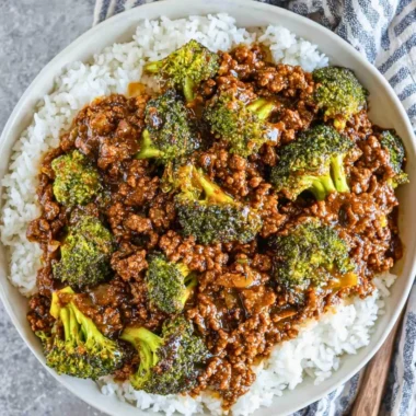 Honey Garlic Ground Beef with Broccoli on a plate garnished with sesame seeds