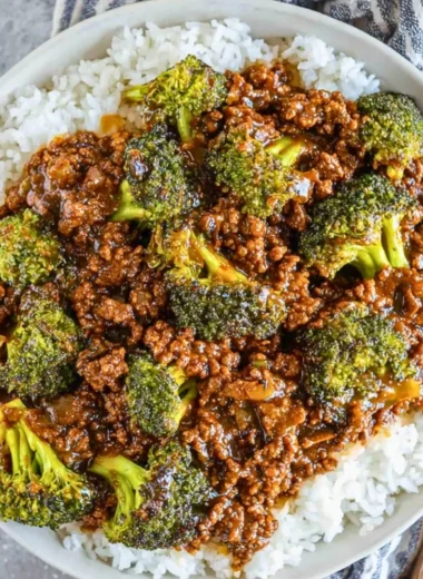 Honey Garlic Ground Beef with Broccoli on a plate garnished with sesame seeds