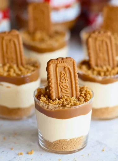 Delicious No Bake Biscoff Cheesecake Cups topped with Biscoff crumbs.