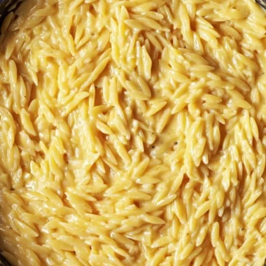 Serving of protein-packed cottage cheese orzo with fresh vegetables