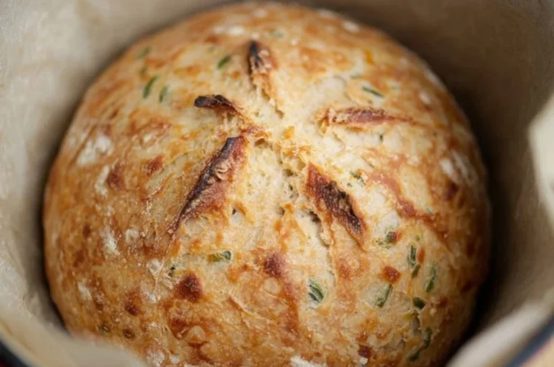 Freshly baked sourdough jalapeño cheddar artisan bread with a golden crust