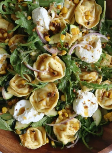 Colorful Summer Tortellini Salad with fresh vegetables and dressing