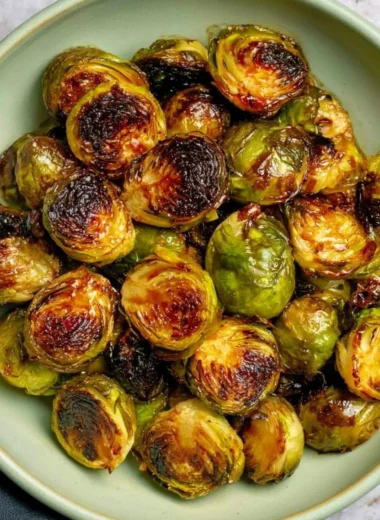 Oven-roasted Maple Balsamic Brussels Sprouts served on a plate