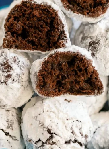 Delicious double chocolate snowball cookies topped with powdered sugar.